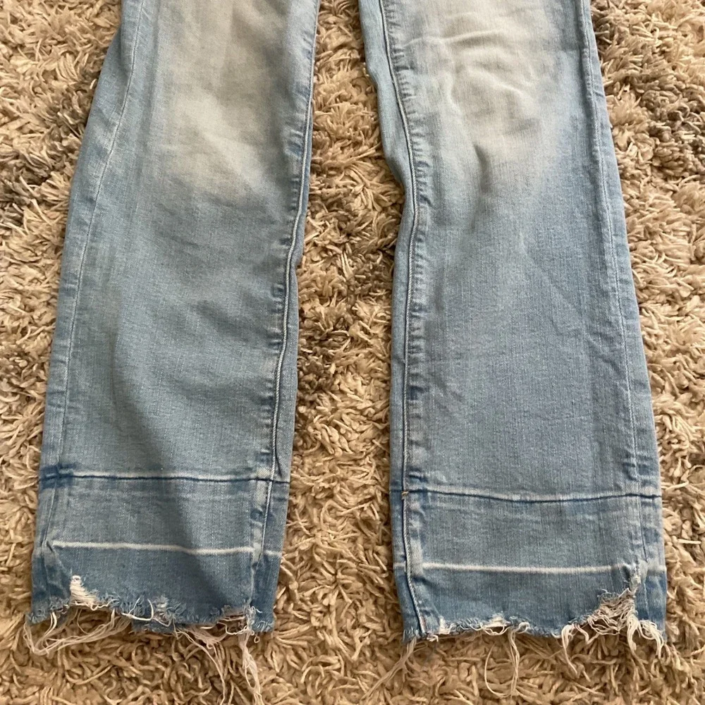 American Eagle Light Wash High Rise Flare Jeans Raw Released Hem Size 00 Regular
